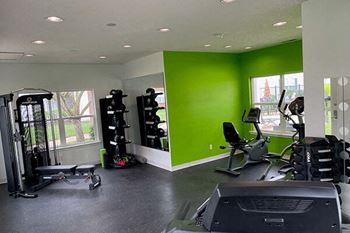 fitness center at apartment complex